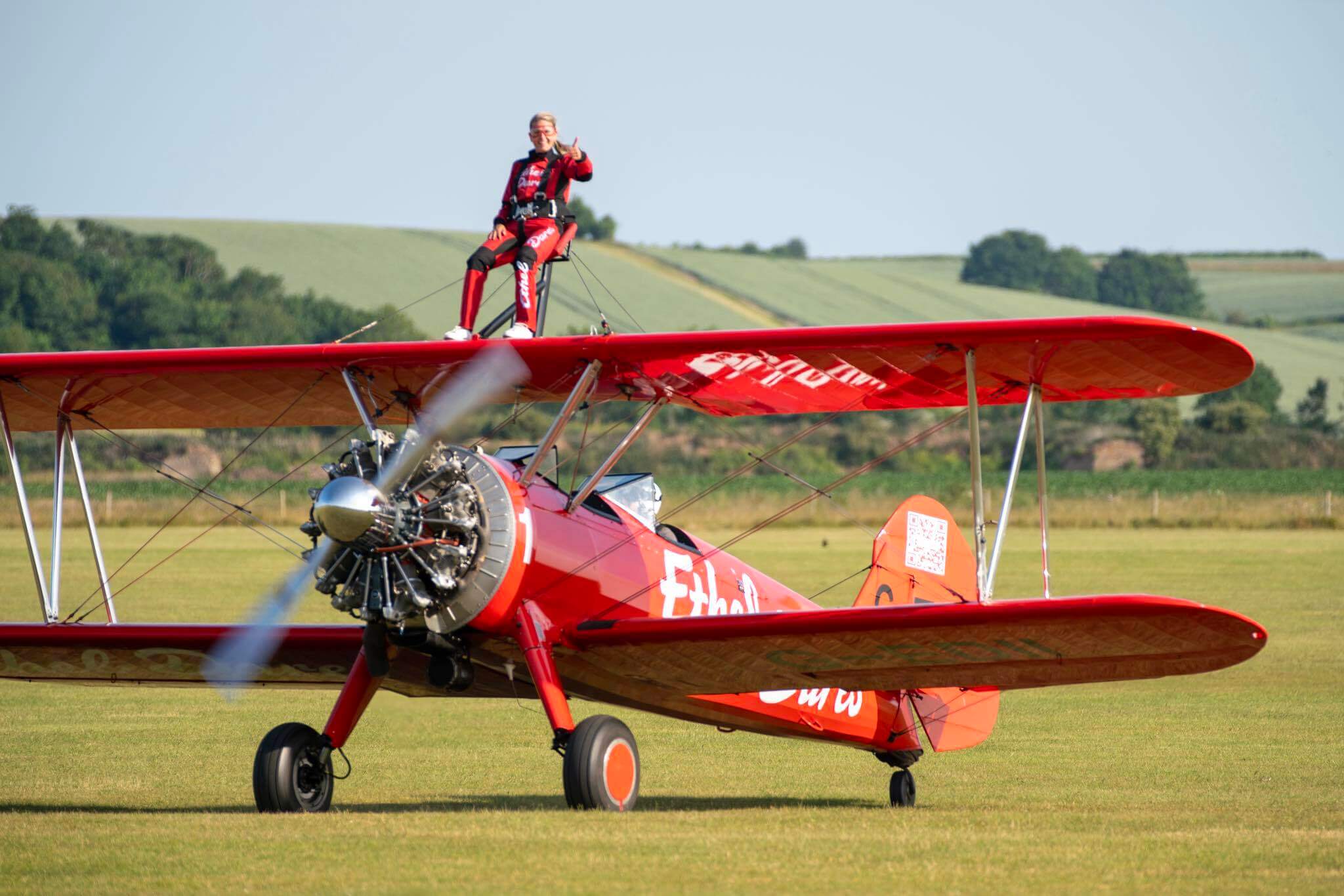 Stephen Jenkinson smiling in aviator gear